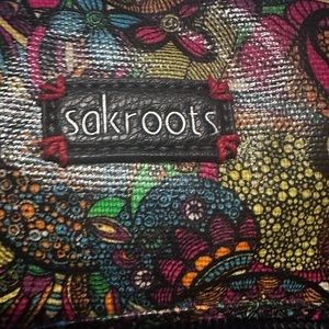 SAKRoots back pack with matching wristlet and keychain wallet .
